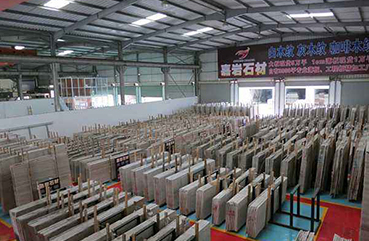嘉巖石材入駐福建水頭中閩石材商城，建立起福建省第一個(gè)超大型精品木紋專賣場(chǎng)。